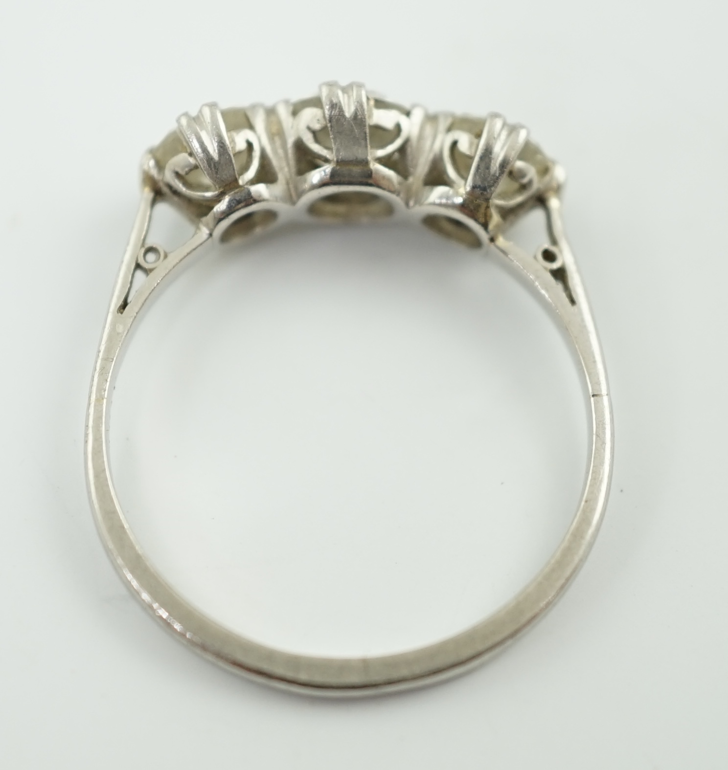 A platinum? and three stone diamond set ring